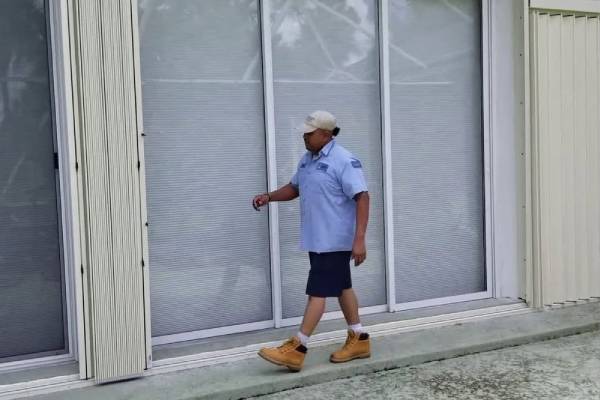 Professional team installing hurricane screen Palm Bay home