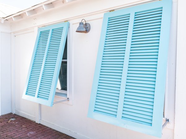 Hurricane window shutters closeup Florida Beach home