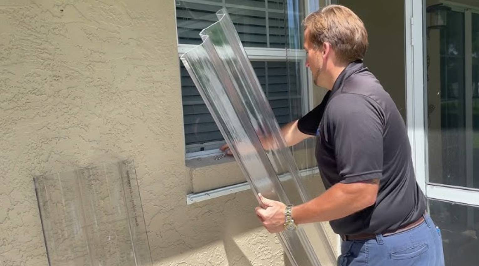 Installing polycarbonate storm panel Florida home