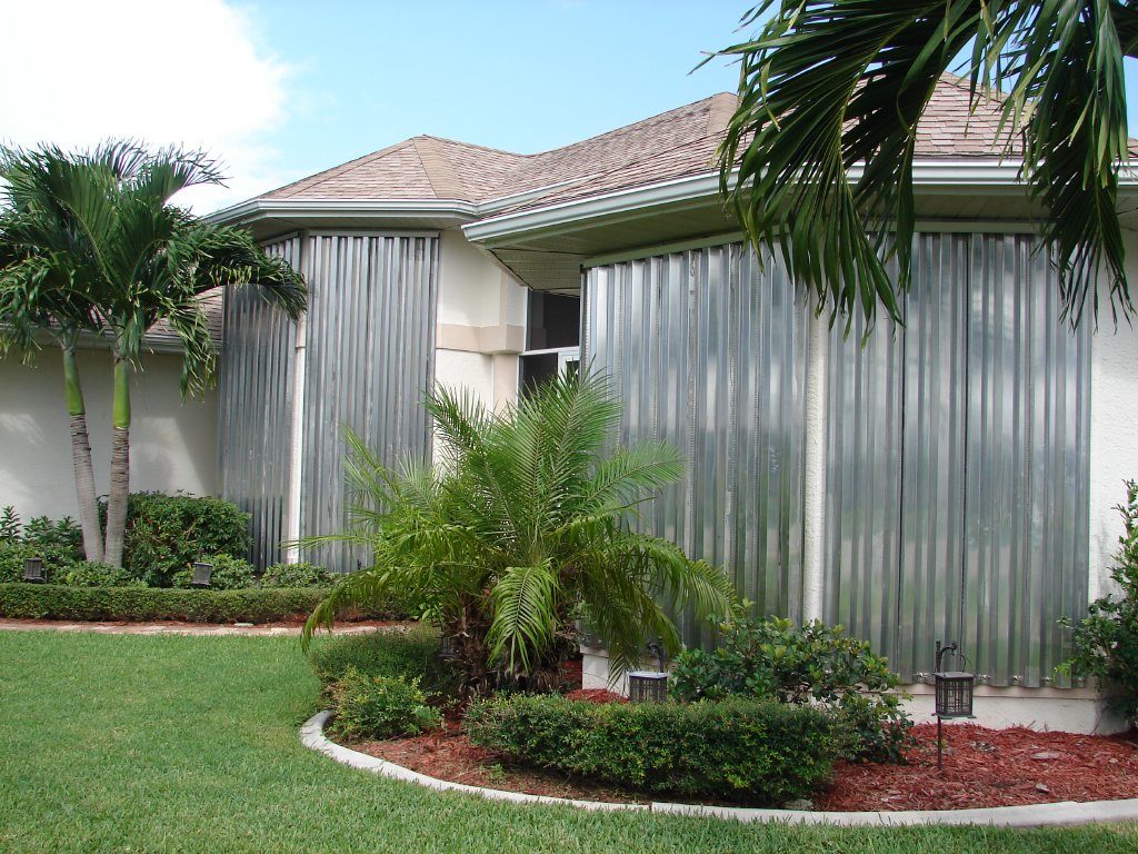 Hurricane shutters storm panel protection home